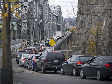 Ottawa Police and RCMP had the downtown core cordon off Wednesday October 22, 2014 after reports of at least one gunman shot and killed a man at the War Monument. Traffic lined the Alexandra Bridge as people tried to leave the downtown core.