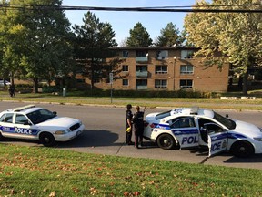 Police were called to the scene of a shooting at an Iris St. housing complex on Friday afternoon.
