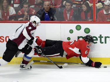 Ottawa Senators' Bobby Ryan (6) gets tangled up with Colorado Avalanche's Matt Duchene (9) during second period NHL action.