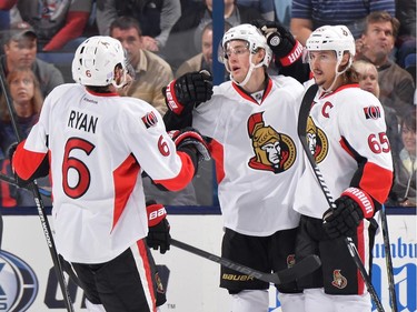 Erik Karlsson #65 of the Ottawa Senators celebrates his third period goal with teammates Bobby Ryan #6 and Kyle Turris #7.