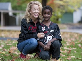 Peggy Taillon and her son Devlin, 7,