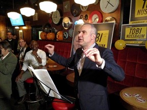 Tobi Nussbaum delivers his victory speech at the Clocktower Pub.