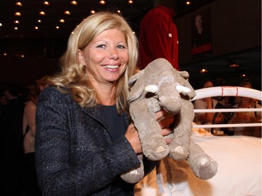 Rogers TV vice president Colette Watson, with a prop from the party, at the Ottawa premiere of Elephant Song at the National Arts Centre on Monday, Sept. 29, 2014.