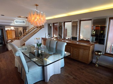 The couple's home (as well as their partially finished condo) have a distinctive modern flair and a green pedigree. Shown is the dining room.