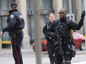 Ottawa Police take action near the Rideau Centre, October 22, 2014.