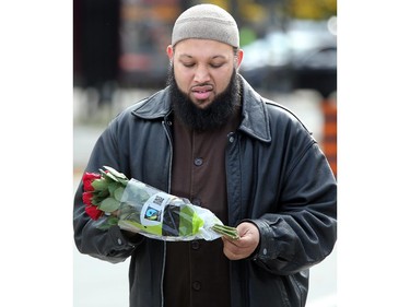 Sikander Hashmi, the imam at the Kanata Muslim Association, showed up to lay flowers and pay his respects at the site. Although much of the area around the National War Memorial and Parliament is still blocked off with police barriers, people were allowed to pay their respects Thursday, laying flowers and notes for the soldier killed in the terrorist attack Wednesday in Ottawa.