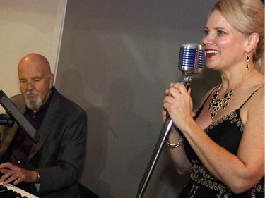 Singer Lee Anne Frederickson and pianist Brian Browne performed at the inaugural HERA Mission charity gala in support of widows and orphans in western Kenya, co-hosted by the Ottawa Redblacks CFL team at the TD Place on Wednesday, Oct. 15, 2014.