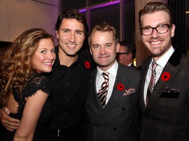 Sophie GrÈgoire and her husband, Liberal Leader Justin Trudeau, with former TV broadcaster Seamus O'Reagan, now a Liberal candidate for St. John's, Nfld., and his husband, Steve Doss, at the Hope Live gala held Monday, Oct. 27, 2014, at the GCTC.