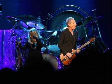 Stevie Nicks (L) and Lindsey Buckingham (R) of Fleetwood Mac perform during the On With the Show Tour 2014 at Canadian Tire Centre in Ottawa on October 26, 2014.