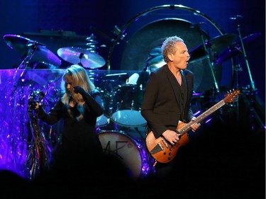 Stevie Nicks (L) and Lindsey Buckingham (R) of Fleetwood Mac perform during the On With the Show Tour 2014 at Canadian Tire Centre in Ottawa on October 26, 2014.