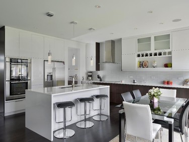 Cardel Homes and Deslaurier Custom Cabinets won production kitchen, 130 square feet or more.