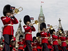 The Ceremonial Guard band plays as the daily Changing of the Guard parade leaves Parliament Hill Tuesday June 25, 2013 in Ottawa.