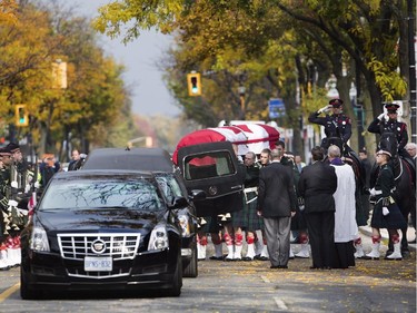 The coffin is carried to the hearse following the funeral service for Cpl. Nathan Cirillo.