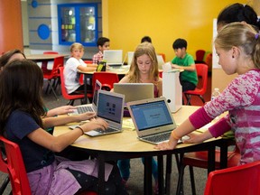 The textbook definition of a classroom is changing. At St. Cecilia school, the concept of “classroom” extends throughout the entire school — every rainbow-hued nook and cranny seemingly offers a place for individuals, duos and groups to study in their own unique environment.