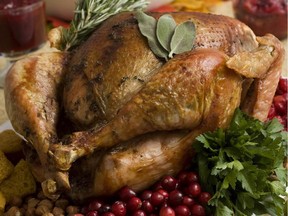 This Nov. 2, 2009 file photo shows a Thanksgiving turkey. The average Turkey Day dinner will cost $49.04, or just 44 cents less in 2013 than it did in 2012.