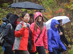 Sir Wilfrid Laurier Secondary School student Anastasia Bourka walks with students from Beijing during her school's Walk for Water event.