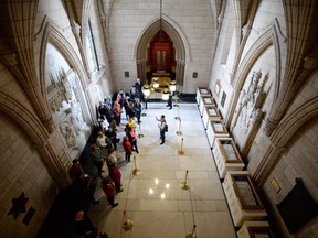 Visitors tour Center Block on Parliament Hill as public access to the site resumes in Ottawa on Monday, Oct. 27, 2014., following last week's shooting.