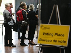 Voters went to city hall to take advantage of the first advance poll in the municipal elections being held on October 27. Assignment 118495 // Photo taken at 10:44 on October 1, 2014. (Wayne Cuddington/Ottawa Citizen)