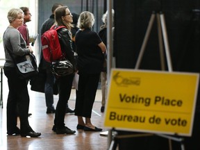 Voters went to city hall to take advantage of the first advance poll in the municipal elections being held on October 27. Assignment 118495 // Photo taken at 10:44 on October 1, 2014. (Wayne Cuddington/Ottawa Citizen)