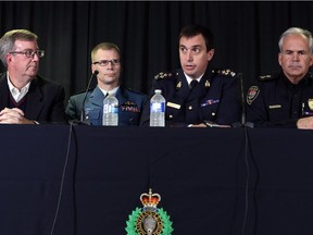 Ottawa Mayor Jim Watson (left to right), Major General Christopher Coates, RCMP Assistant Commissioner Gilles Michaud and Ottawa Police Chief Charles Bordeleau hold a joint news conference regarding the shooting in Ottawa, Wednesday, October 22, 2014.