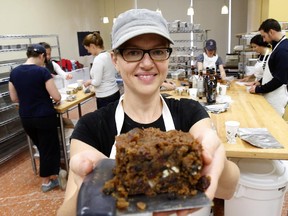 Yael Matte, her husband, baker Patrick Graham, and their 10-year-old son Noah, started at 7 a.m. to mix the batter and bake the cakes, which are studded with pecans and dried mango, cherries and cranberries. A group of Melody's friends had already met a few days earlier to chop the hundreds of pounds of dried fruit and nuts and to cut squares of cheesecloth and foil for wrapping the cakes. By afternoon, when the friends arrived back at the bakery, the cooled cakes were ready for wrapping in cheesecloth and dousing with $1,000 worth of rum. "You could never sell these cakes for what they cost," says Graham. "But it's perfect — family, close friends and Christmas were all so important to her."