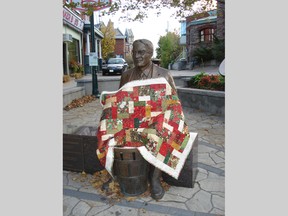 A statue of basketball inventor James Naismith is draped in a quilt to promote the Valley Artisan Show in Almonte Saturday and Sunday.