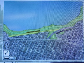 Screen projection of area of contention where the NCC wants either the LRT to be underground or deviated across Rochester Field. A briefing Nov 21 at NCC Headquarters on the decision of the National Capital Commission's Board of Directors regarding options for the light rail systems construction along the Sir John A. Macdonald parkway. (Pat McGrath / Ottawa Citizen)