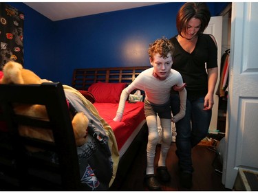 Jonathan Pitre, shown here with his mother,