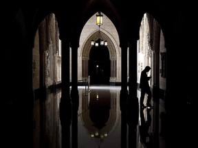 A person walks through the halls of the Centre block on Parliament Hill in Ottawa in a 2010 photo.