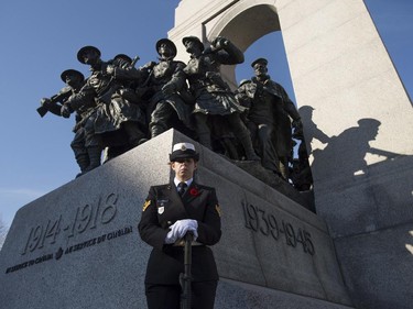 A sentry guards the National War Memorial following the Remembrance Day ceremony in Ottawa on Tuesday, Nov. 11, 2014.