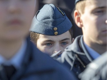 A young air force cadet has trouble seeing past the front rank as the annual Remembrance Day Ceremony takes place at the National War Memorial in Ottawa.