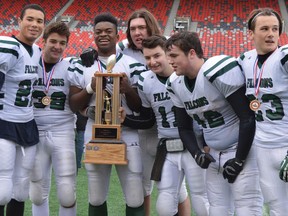 After defeating Glebe Gryphons 38-0 in the National Capital Secondary School Athletic Association senior Tier 2 football final, Philemon Wright Falcons' team captains (left to right) Trevor Hoyte, Vigo Moniz, Adam Ffrench, Yann-Michel Forest-Bruyere, Tyler Gray, Noah Bowers and Brae Walker collect the big prize.