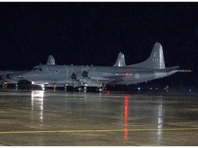 A CP-140M Aurora reconnaissance aircraft taxies as it leaves CFB Greenwood in Nova Scotia's Annapolis Valley on Friday, October 24, 2014. The aircraft and personnel will participate in Operation IMPACT, as part of Canada's contribution to the war against the Islamic State in Iraq and the Levant. THE CANADIAN PRESS/Andrew Vaughan