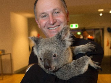 New Zealand's Prime Minister John Key meets Jimbelung the koala.