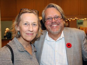 Award-winning author Elizabeth Hay with Ottawa lawyer Yves Mènard on Thursday, Nov. 6, 2014, at Library and Archives Canada for the 17th annual live auction and benefit concert for the TD Ottawa Jazz Festival.