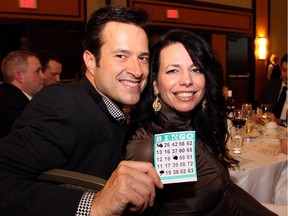 Bruce Raganold from Welch LLP with his wife, Giselle Bergeron-Raganold, at the Black Tie Bingo fundraiser for the Eldercare Foundation of Ottawa and the OutCare Foundation, held Saturday, November 22, 2014, at the Westin hotel.