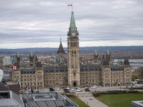 Centre Block on Parliament Hill in Ottawa is surrounded by police vehicles on on Wednesday, Oct. 22, 2014.