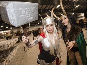 Charlee Blackwater as Thor and Miyah Blackwater as Loki strike a pose at Ottawa Pop Expo at the EY Centre in Ottawa Saturday