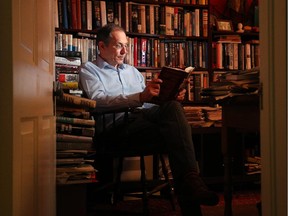 Citizen columnist Andrew Cohen sits in his Ottawa study, filled with books about John F. Kennedy.