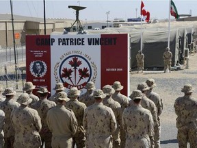 Combat Camera
IS2014-7537-02

Canadian Armed Forces members stand in front of the new Camp Patrice Vincent commemorative wall at the Remembrance Day ceremony in Kuwait during Operation IMPACT on November 11, 2014.



Photo: Canadian Forces Combat Camera, DND

IS2014-7537-02
