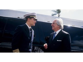 Leonardo DiCaprio, left, on the set of the movie Catch Me If You Can with Frank Abagnale, the former con artist whose story inspired the movie.