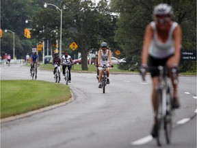 Cyclists ride the Sir John A. Macdonald Parkway on Sunday, August 31, 2014 on the last day of Alcatel-Lucent Sunday Bikedays in Ottawa. (Cole Burston/Ottawa Citizen)