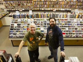 Dan Gamble and Nick Beaton at The Turning Point used record store. As Gamble and his brother ease out, Beaton is easing in.