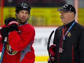 'We have to get momentum back on our side. The only thing you can do is win your next game,' says Ottawa Senators coach Paul MacLean, seen with David Legwand during a practice this season.