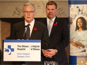 Ottawa Hospital president and CEO Dr. Jack Kitts, left, and MP John Baird, the minister responsible for the National Capital Commission, announce a Carling Avenue land lease to the Ottawa Hospital for a future hospital campus on Monday.