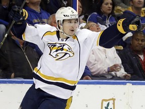 Nashville Predators' Filip Forsberg, of Sweden, celebrates after scoring during the first period of an NHL hockey game against the St. Louis Blues, Thursday, Nov. 13, 2014, in St. Louis.