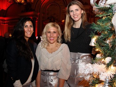 From left, Alyssa Beltempo, Angie Russell and April Atherton are seen with their tree, sponsored by Bayshore Shopping Centre, at the Trees of Hope for CHEO event held at the Fairmont Chateau Laurier on Monday, November 24, 2014.