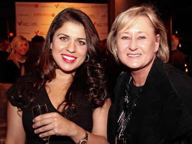 From left, Amita Kochar with gala committee member Jane Bachynski at a reception held Wednesday, November 19, 2014 at Lago's to promote a charity gala being hosted by Nordstrom when it opens a new store in Ottawa this March.