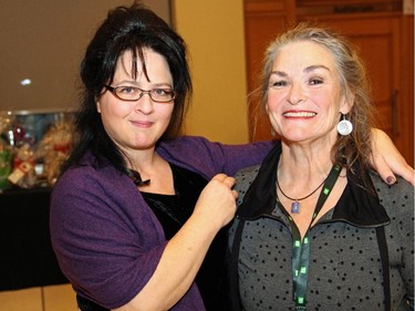 From left, Canadian vocalist Susie Arioli, seen with Catherine O'Grady, was the musical headliner for the annual benefit concert held Thursday, Nov. 6, 2014, at Library and Archives Canada in support of the TD Ottawa Jazz Festival.