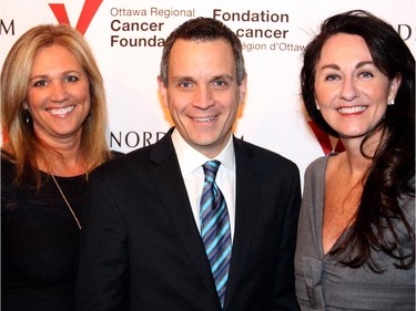 From left, gala co-chairs Mary Taggart and Mark Sutcliffe with Karen McKibbin, president of Nordstrom Canada, at a reception hosted by Nordstrom at Lago Bar and Grill on Wednesday, November 19, 2014 to promote their store-opening charity gala in March.